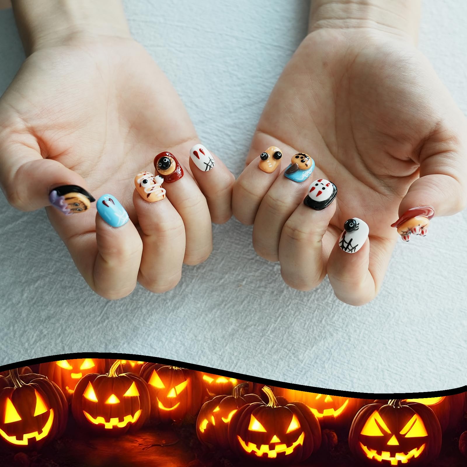 Tesytto Nightmare cobwebs and ghosts nail art for festive style