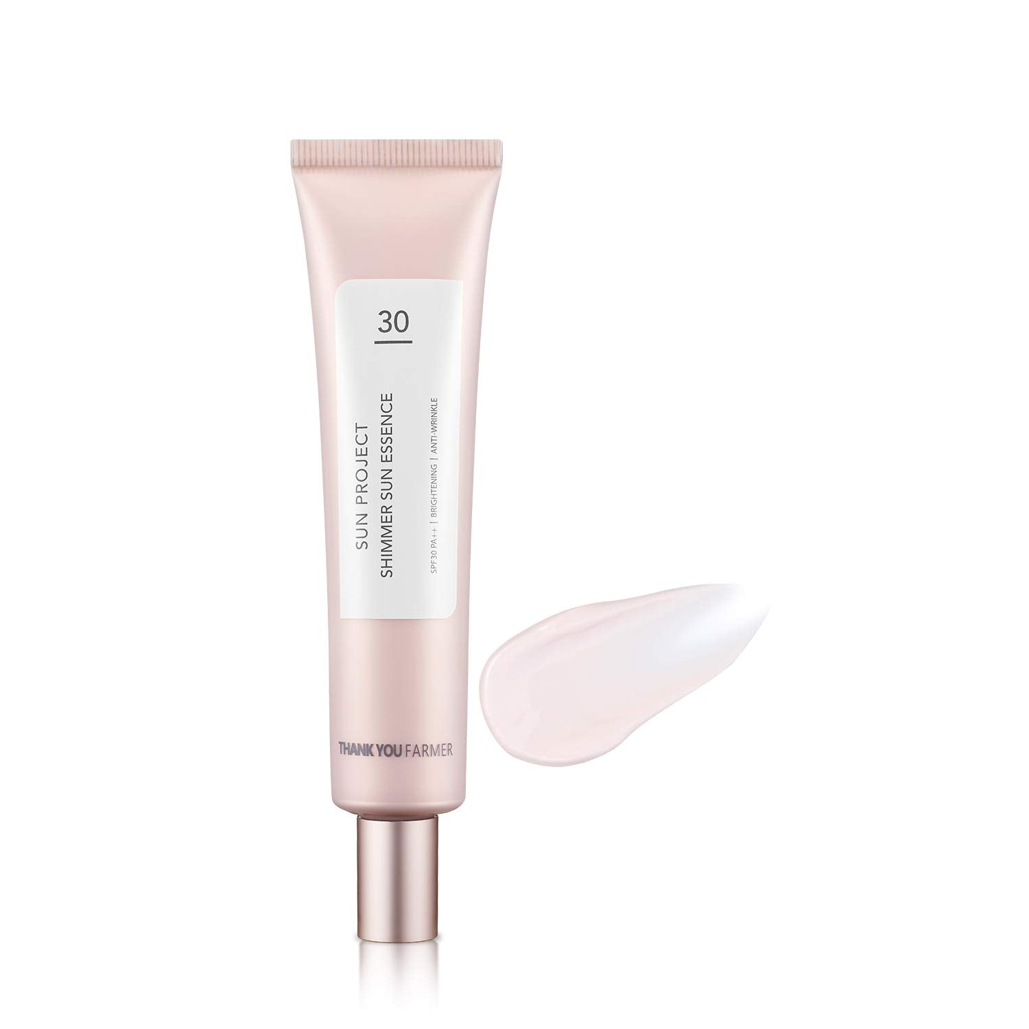 Thank You Farmer Sun Project Shimmer Sun Essence SPF 30 adds pink radiance for a fresh, dewy look.