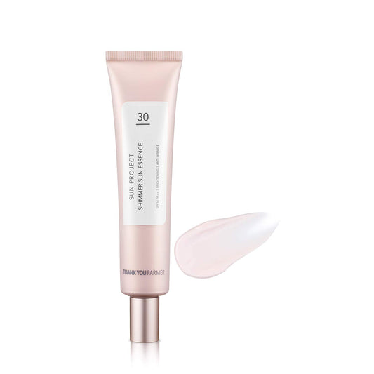 Thank You Farmer Sun Project Shimmer Sun Essence SPF 30 adds pink radiance for a fresh, dewy look.