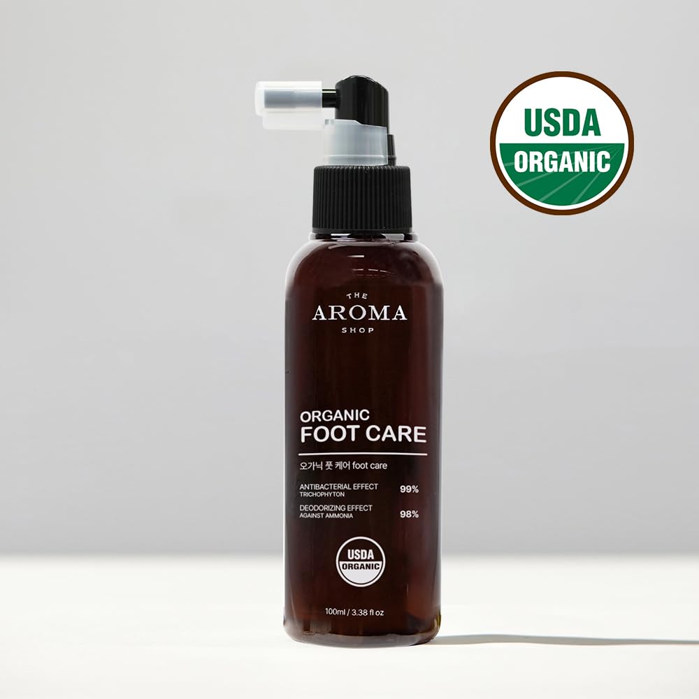 The Aroma Shop organic rose oil ingredient close-up for natural fragrance and soothing touch.