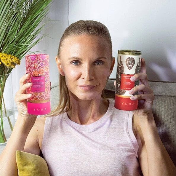 The Ayurveda Experience Manjish Glow Elixir pour shows pink Manjistha infusion for glow
