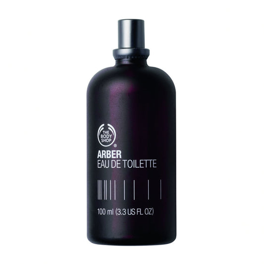 Close-up of Activist EDT bottle highlighting citrus notes and spicy heart.