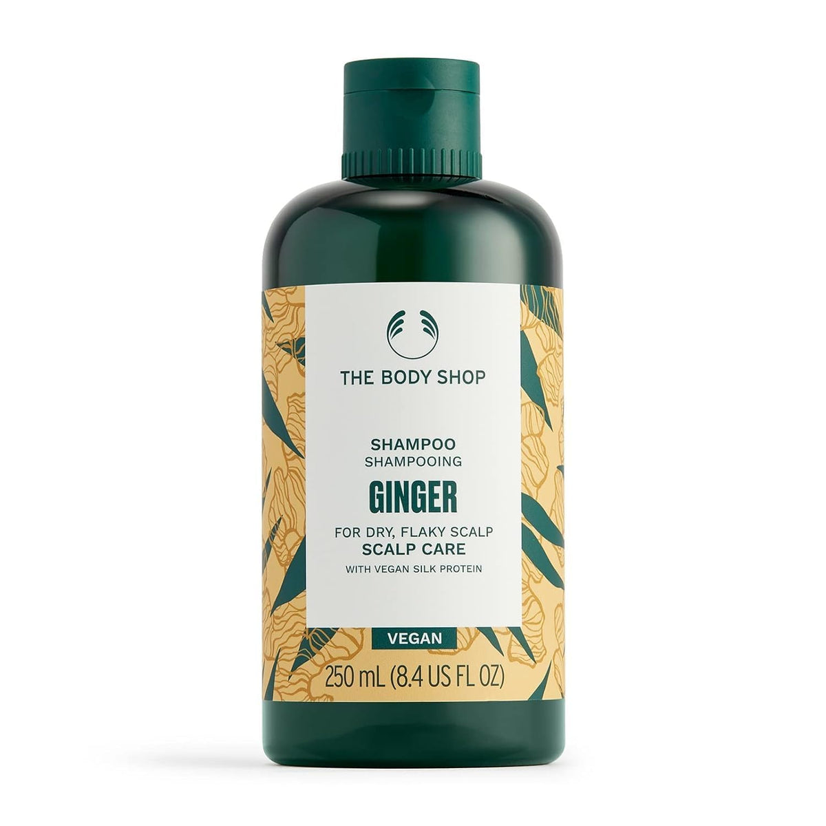 The Body Shop ginger anti dandruff shampoo bottle with fresh scent for daily cleanse.