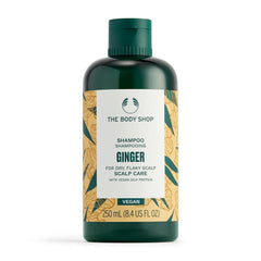 The Body Shop ginger anti dandruff shampoo bottle with fresh scent for daily cleanse.