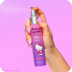 The Creme Shop Hello Kitty Purple mist bottle refreshes makeup base for a flawless finish.