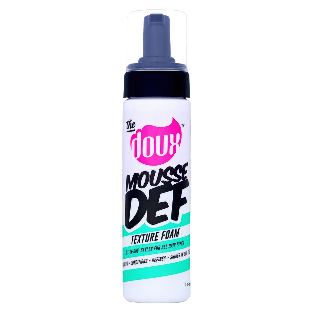 The Doux Mousse bottle-application demonstrates even distribution for defined curls.