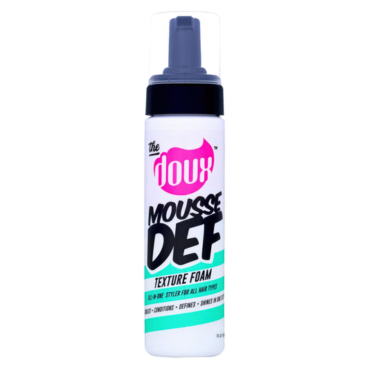 The Doux Mousse bottle-application demonstrates even distribution for defined curls.