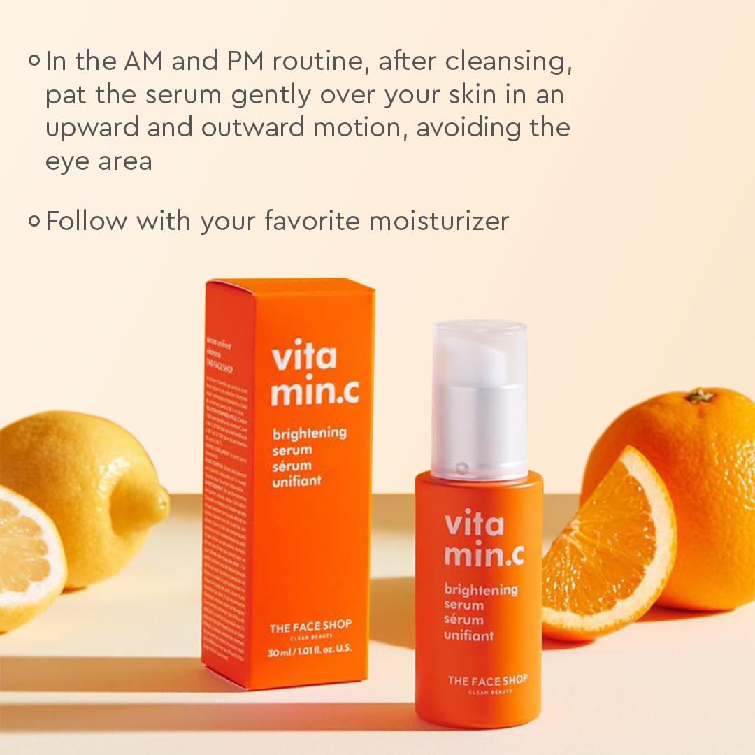 The Face Shop Vitamin C Serum on hand demonstrates lightweight moisturizer feel.