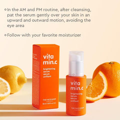 The Face Shop Vitamin C Serum on hand demonstrates lightweight moisturizer feel.
