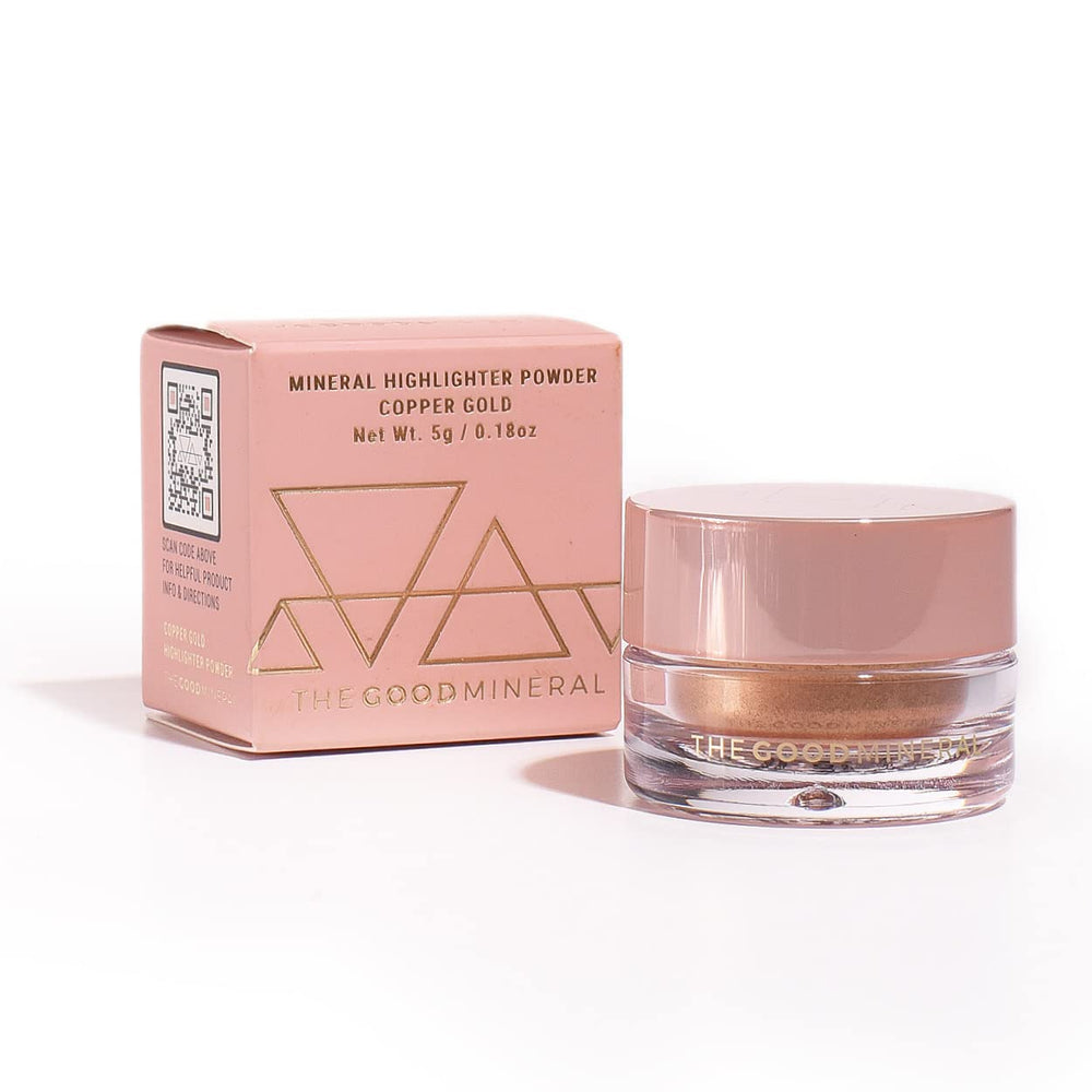 The Good Mineral Copper Gold highlighter on skin for subtle radiance.
