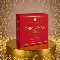 The Heart Company Christmas Love ornamental cap accents a romantic scent.