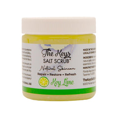 The Keys Salt Scrub hands applying scrub for full-body exfoliation and moisture.