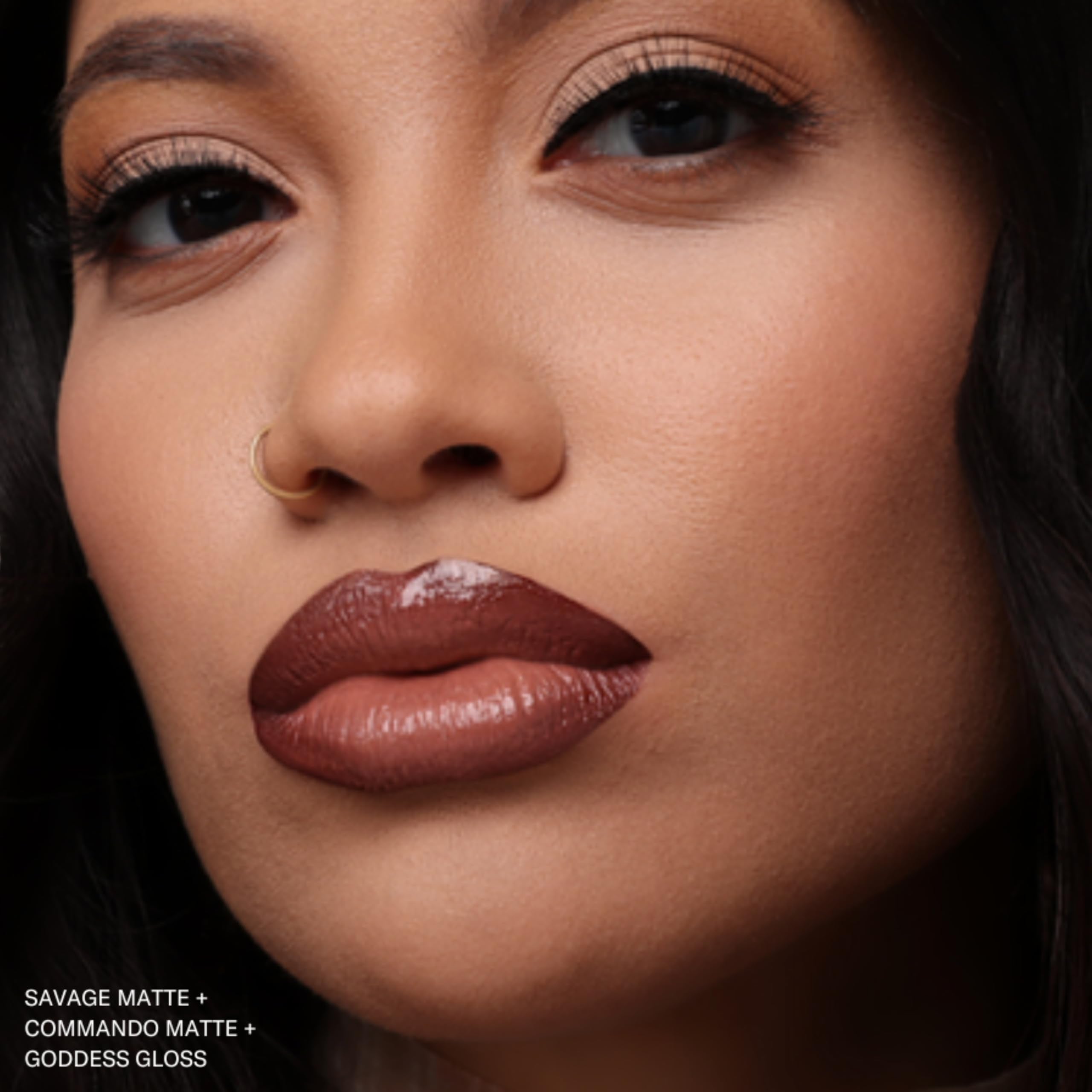 Layering with gloss for shine on Commando lipstick close-up