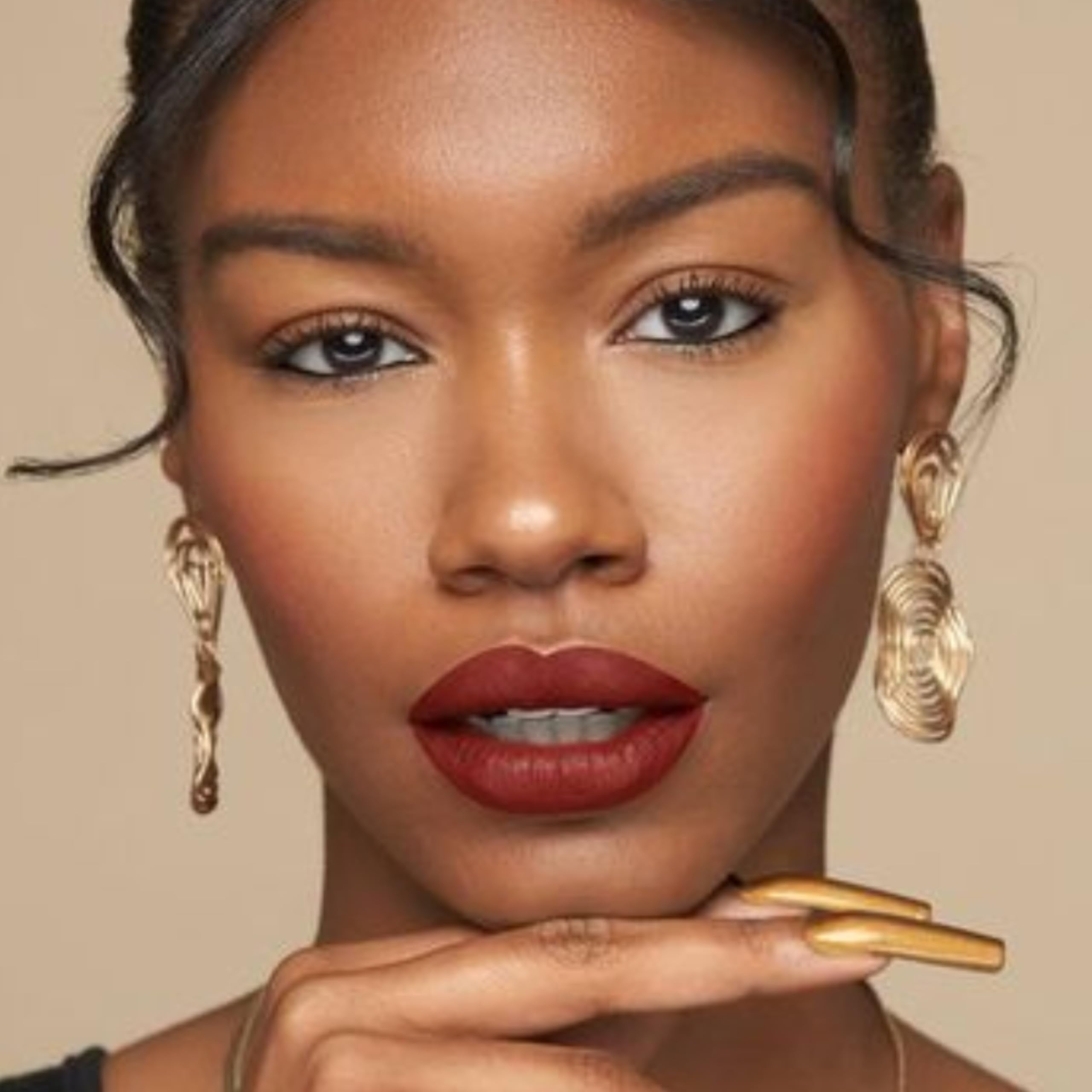 The Lip Bar gloss layering adds shine and dimension.