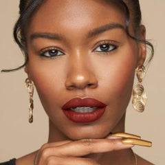 The Lip Bar gloss layering adds shine and dimension.