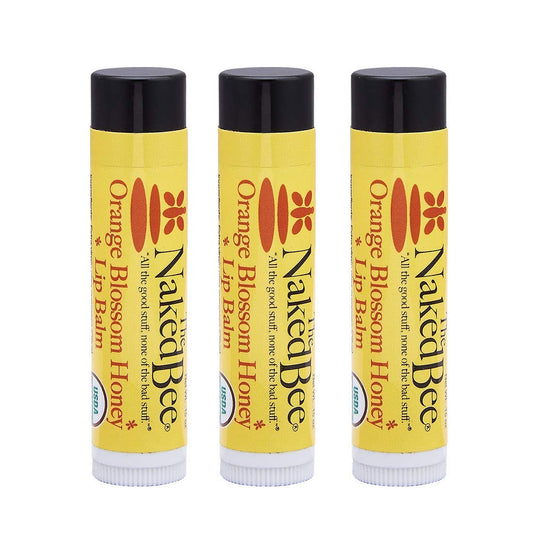 The Naked Bee Organic Orange Blossom Honey Lip Balm 3-Pack nourishes lips with natural oils.