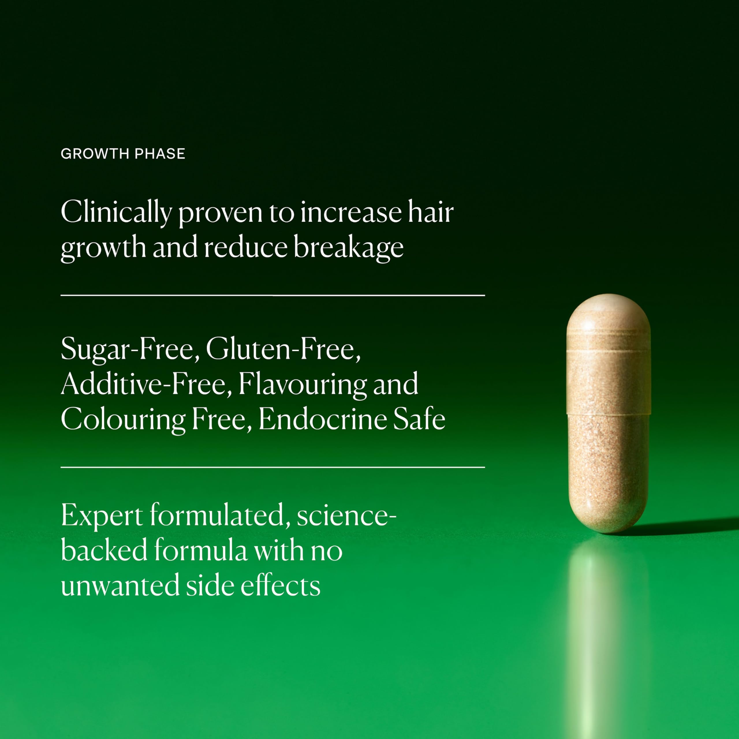 Close-up of Growth Phase capsules indicating vegan hair health support