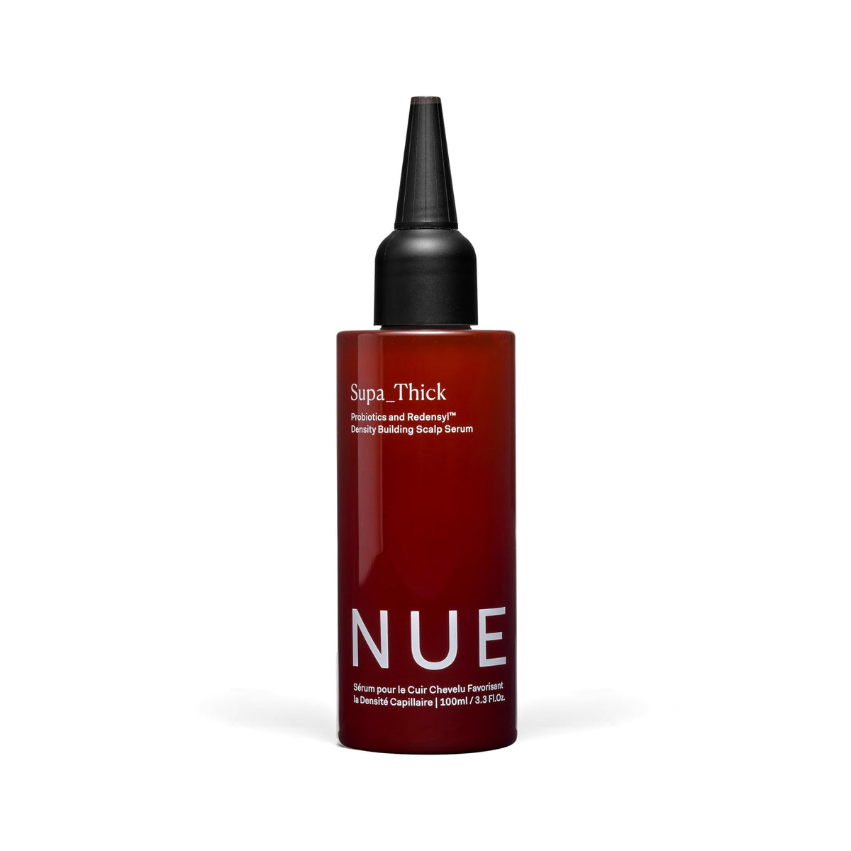 The Nue Co Supa Thick Hair Serum bottle close-up for a lightweight, refreshing scalp treatment.