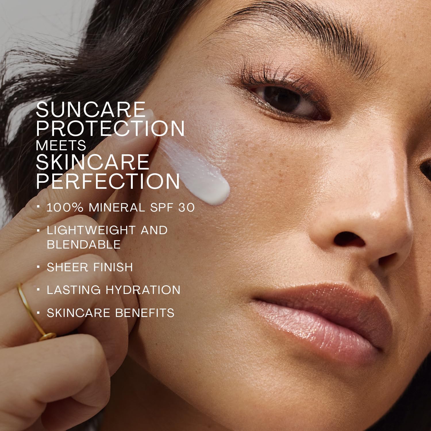 The Outset Hydrasheer vegan packaging symbol close-up signaling clean formulation.
