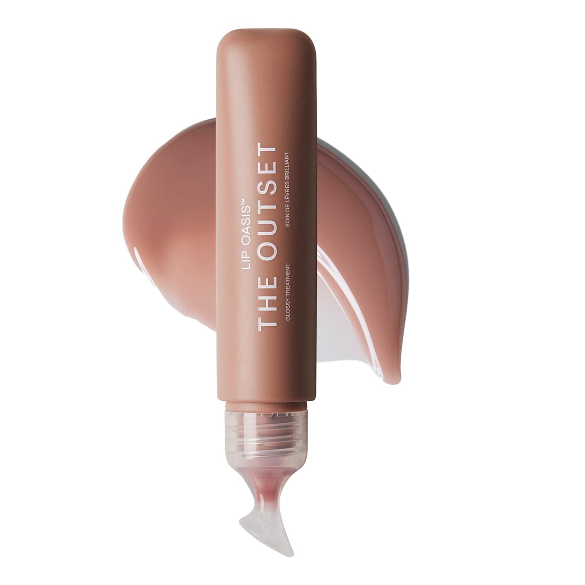 The Outset Lip Oasis glides on with a glassy finish, delivering lasting hydration.
