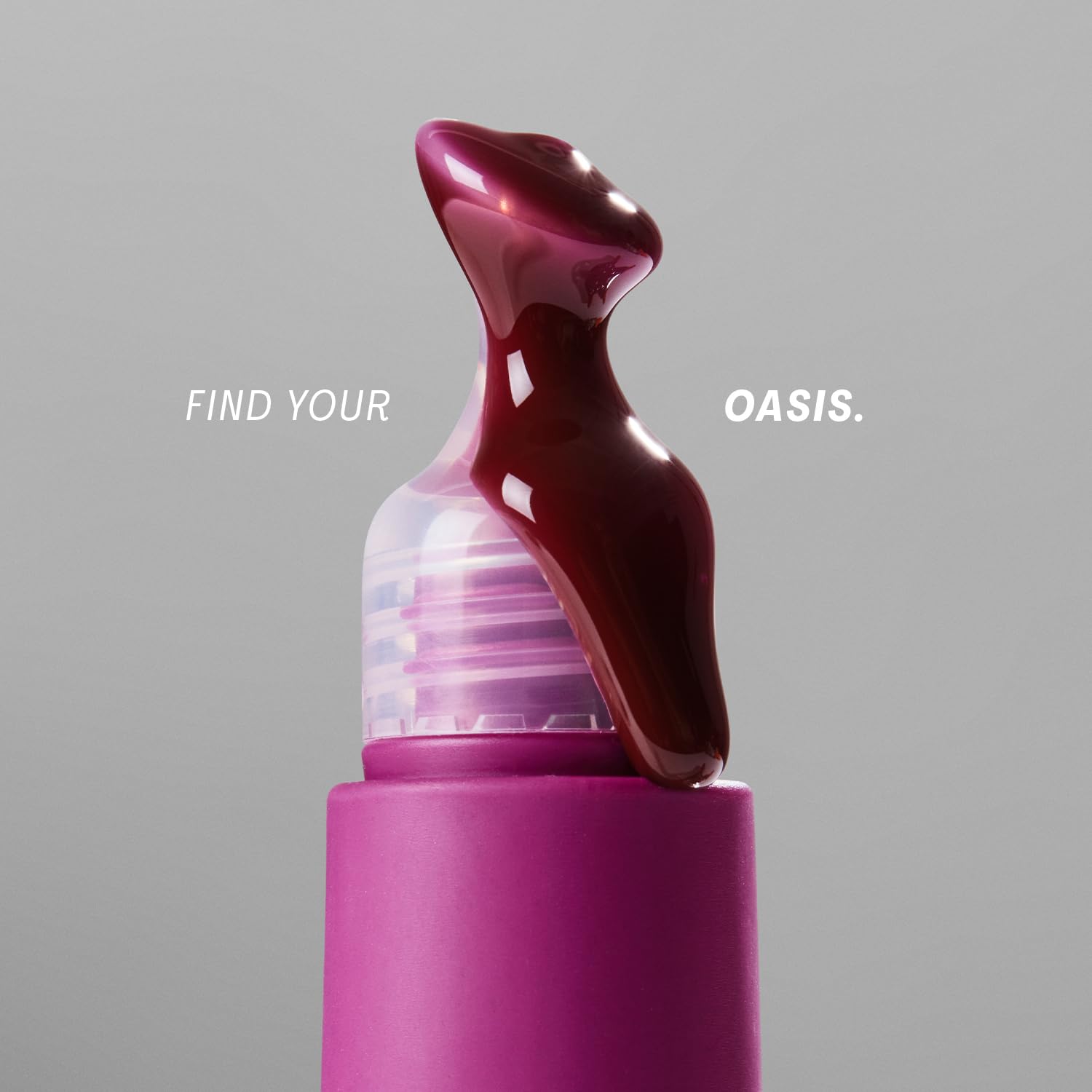 The Outset Lip Oasis packaging emphasizes clean, vegan formula.