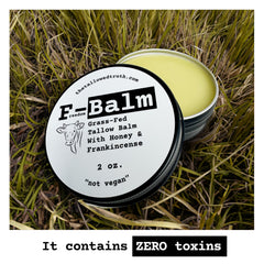 Close-up of The Tallowed Truth F-Balm for facial application.