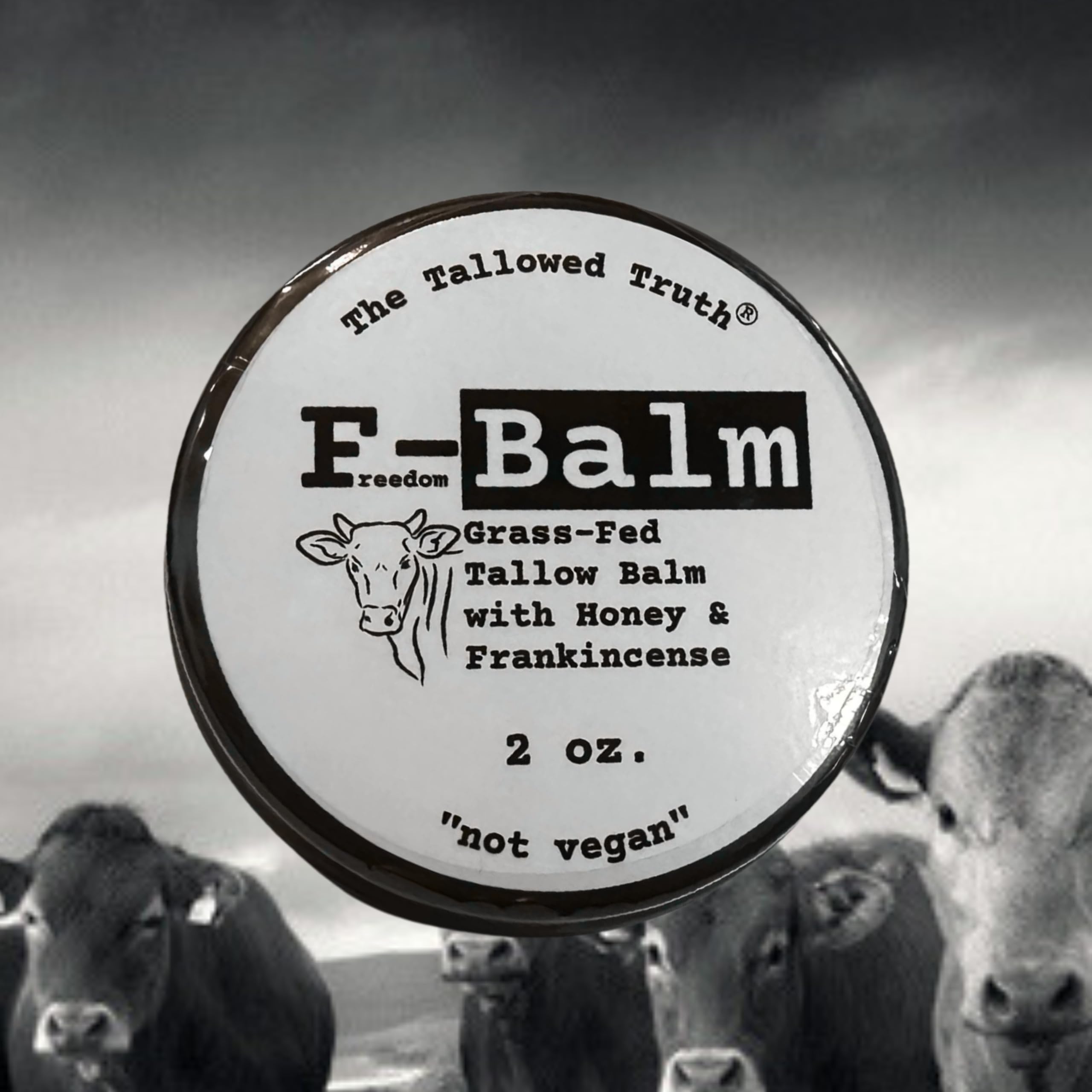 Two-ounce The Tallowed Truth balm beside skincare tools