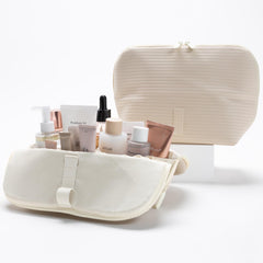 THE VERTI 23-pocket layout keeps toiletries neatly arranged for flight use