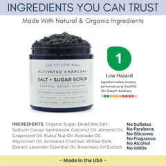 The Yellow Bird activated charcoal scrub with scoop demonstrates easy at-home use.