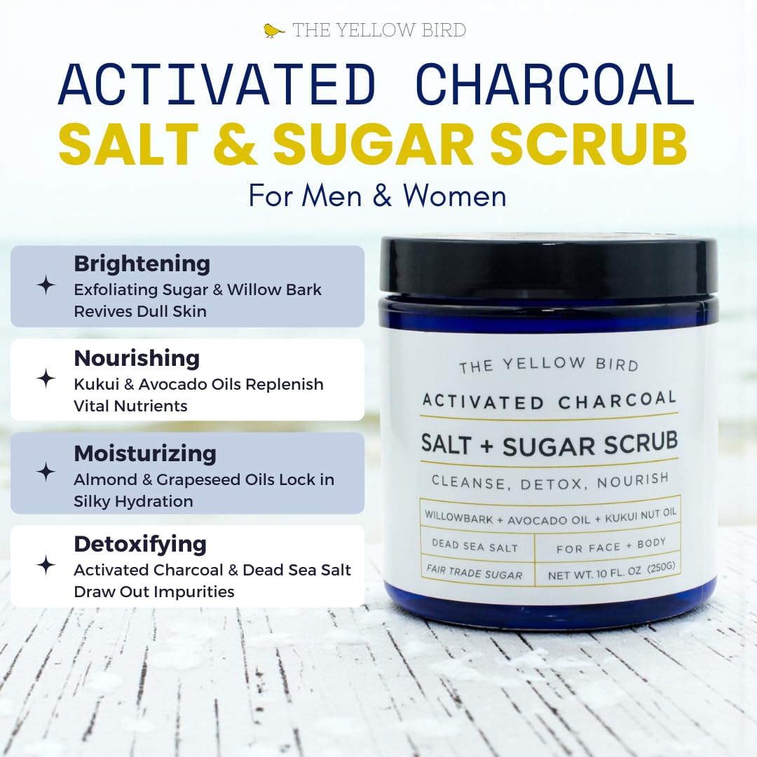 The Yellow Bird activated charcoal scrub texture closeup showing salt and sugar exfoliation.