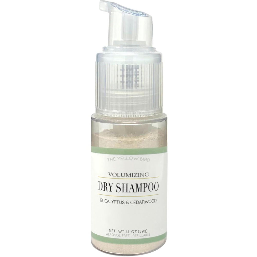 The Yellow Bird dry shampoo pump-action bottle for a quick hair refresh.