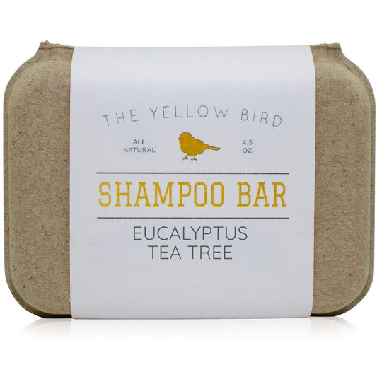 The Yellow Bird eucalyptus tea tree shampoo bar in sustainable packaging for eco conscious care
