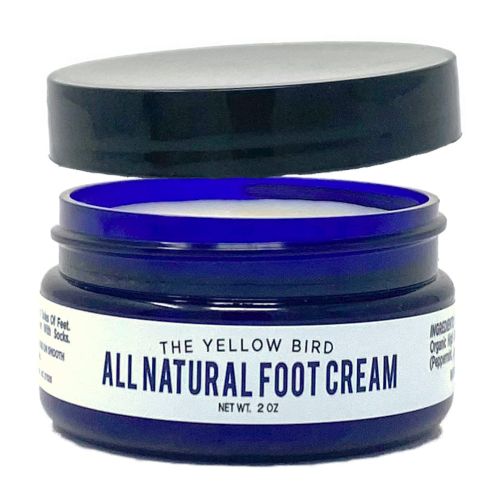 The Yellow Bird foot cream tub ready for hydrating daily foot care.