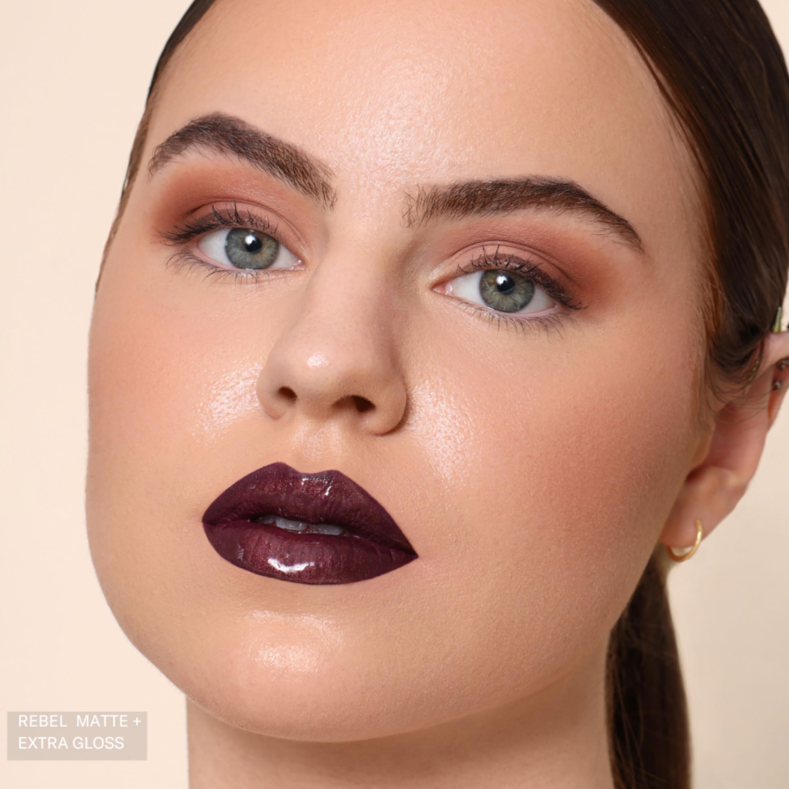 The Lip Bar Rebel lip care blend with jojoba oil and vitamin E.