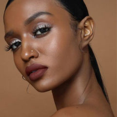The Lip Bar Savage velvet finish texture appears smooth and comfortable.