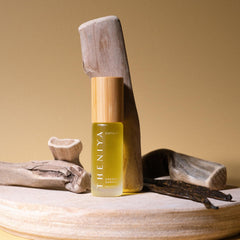 Theniya cuticle oil manicure-ready bottle for home use.