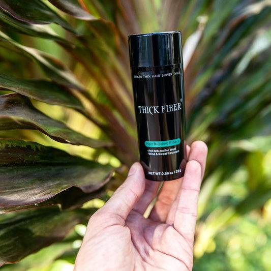 THICK FIBER bottle side view highlights easy grip for daily application.