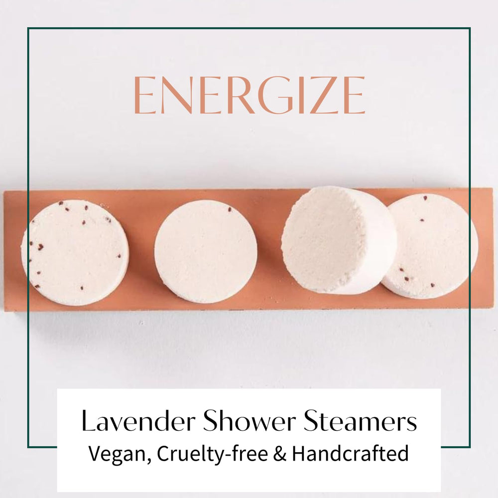 Thulisa Naturals pink grapefruit shower steamer closeup releasing citrus aroma.