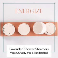 Thulisa Naturals pink grapefruit shower steamer closeup releasing citrus aroma.