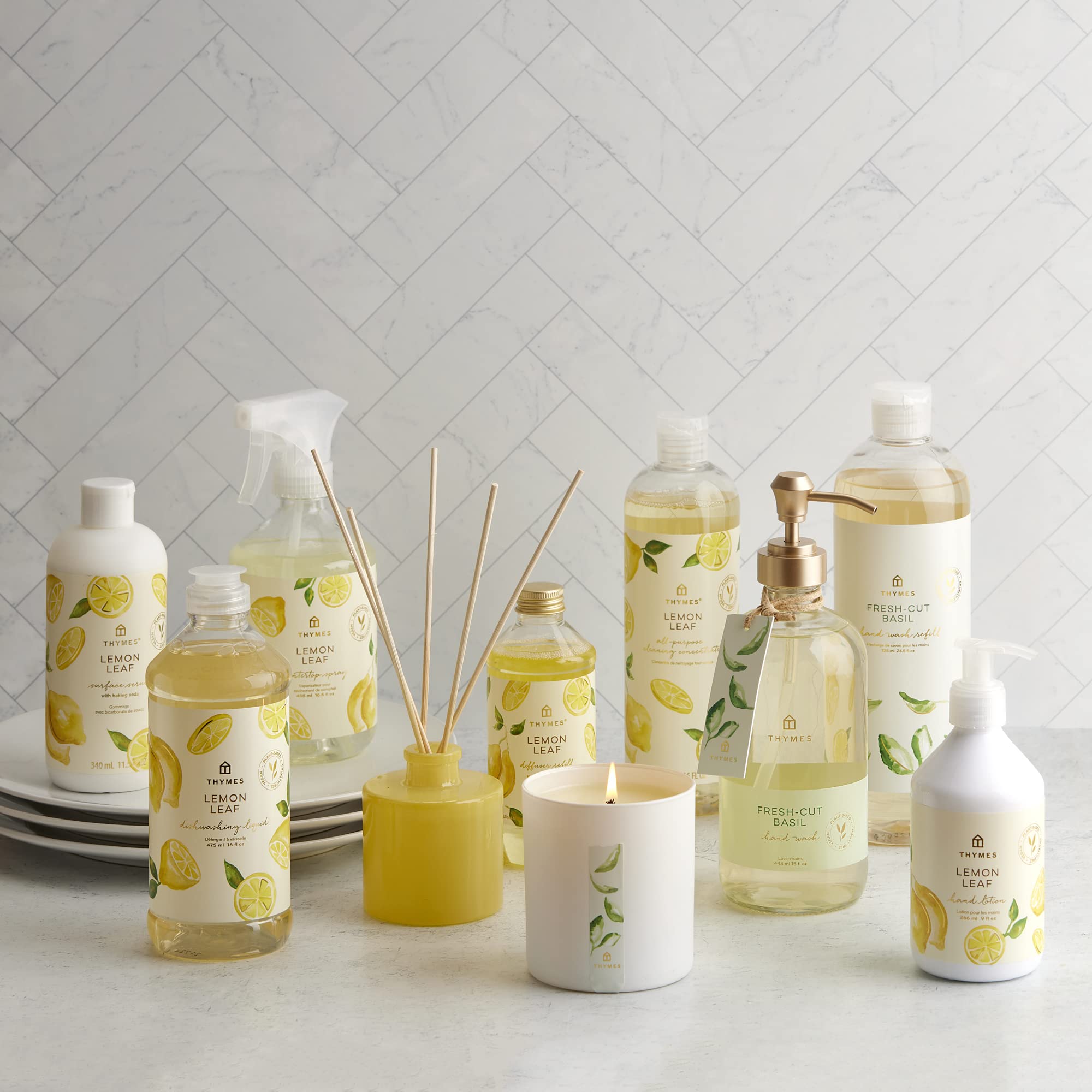 Swirls of Fresh-Cut Basil fragrance in Thymes hand wash imagery.