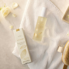 Thymes Goldleaf Shower Spray mist in air creates an uplifting fragrance-rich ambiance.