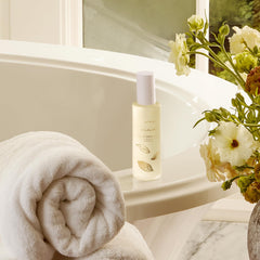 Thymes Goldleaf Shower Spray highlights hyacinth and lily of the valley for green, fresh scents.