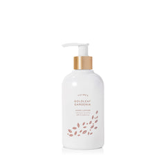 Thymes hand lotion with gold-pump bottle for smooth daily moisturization
