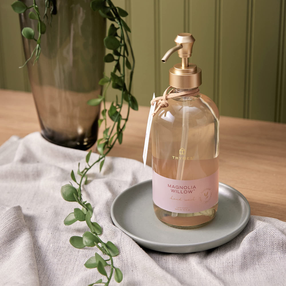 Thymes Magnolia Willow magnolia bloom visual evokes botanical-inspired scent.