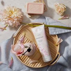 Thymes Kimono Rose Body Scrub texture ready for circular skin massage.