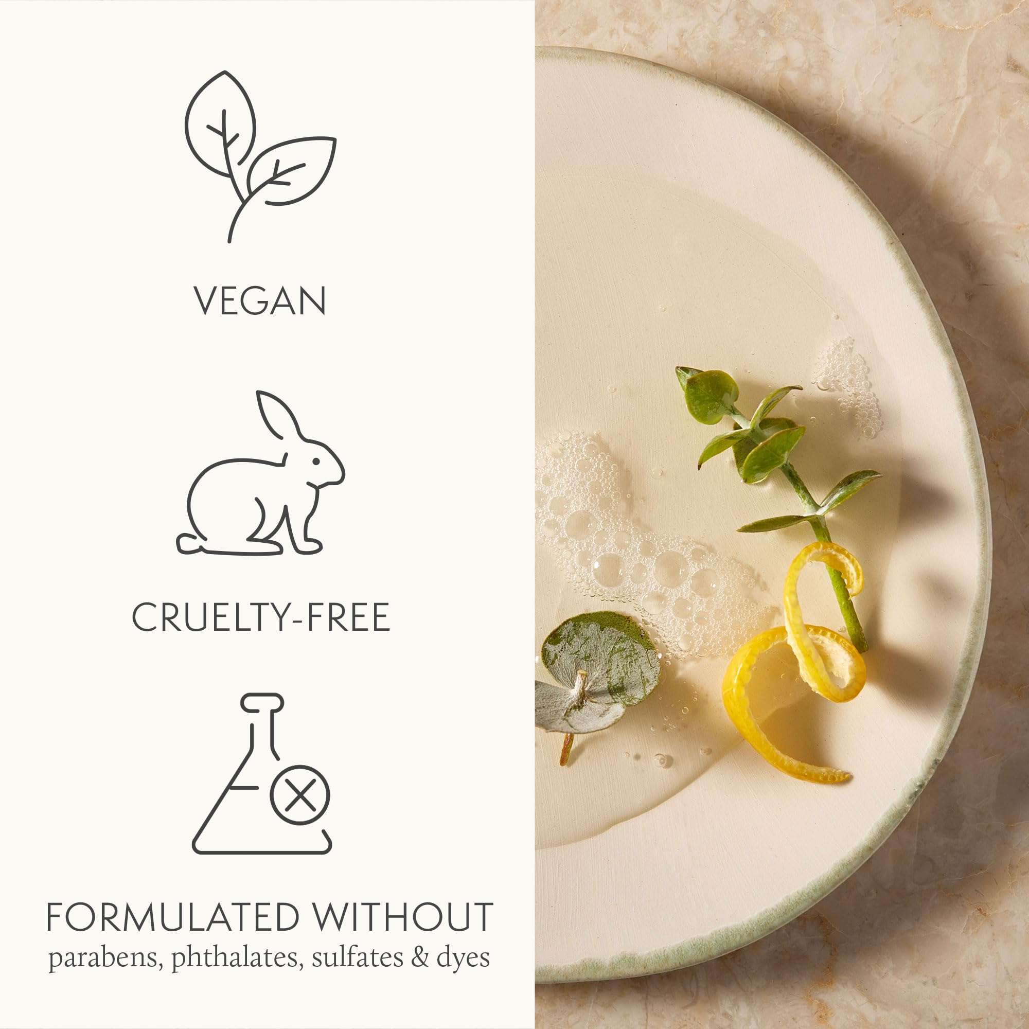 Thymes Nourishing Body Cleanser being applied on wet skin in the shower.