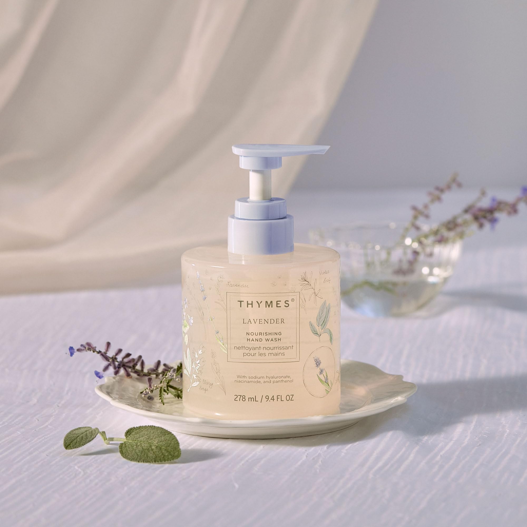 Close-up of product label with rosewood and clary sage notes on Thymes hand wash
