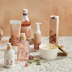 Fragrance notes of palo santo, amber, and clary sage from Thymes Sienna Sage.
