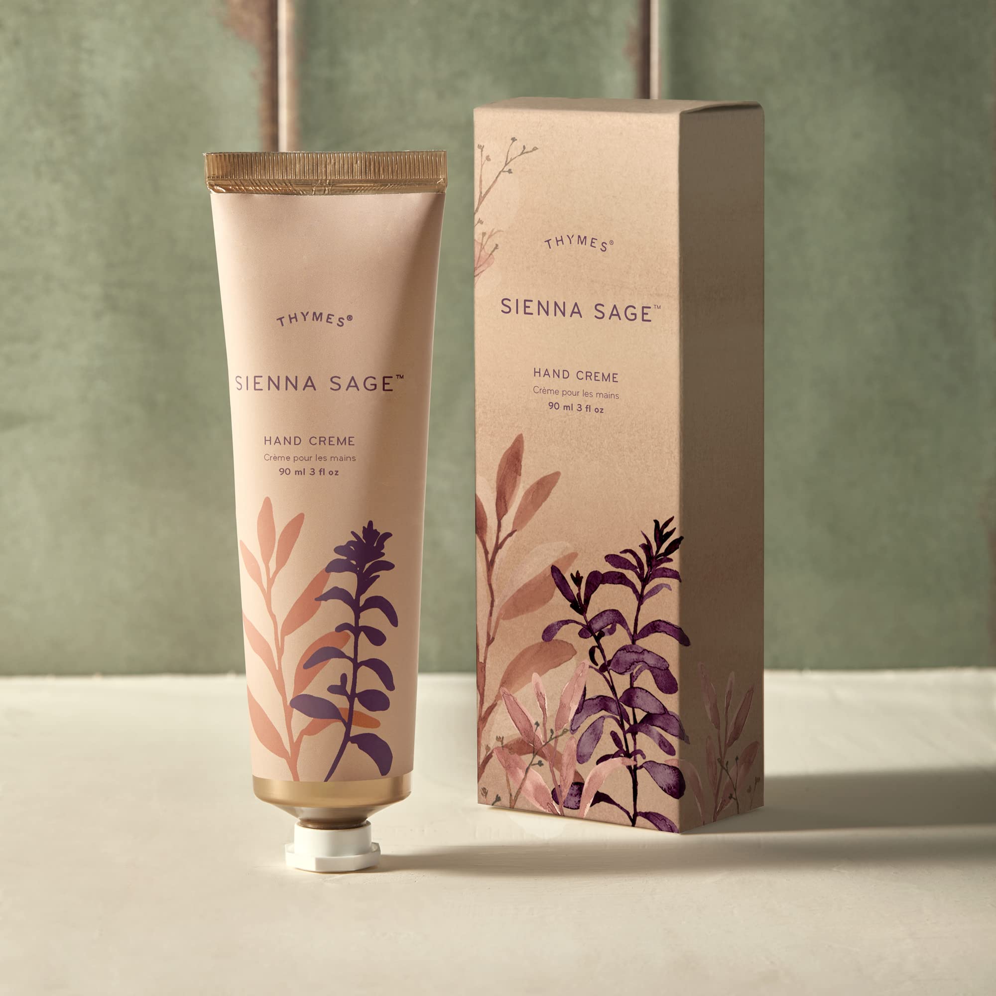 Thymes Sienna Sage Hand Cream pump dispensing hydrating cream.