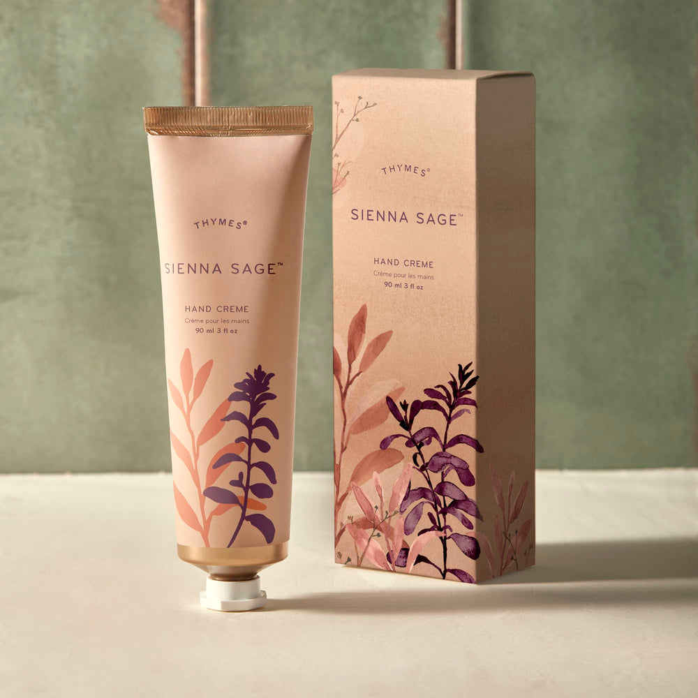 Thymes Sienna Sage Hand Cream pump dispensing hydrating cream.
